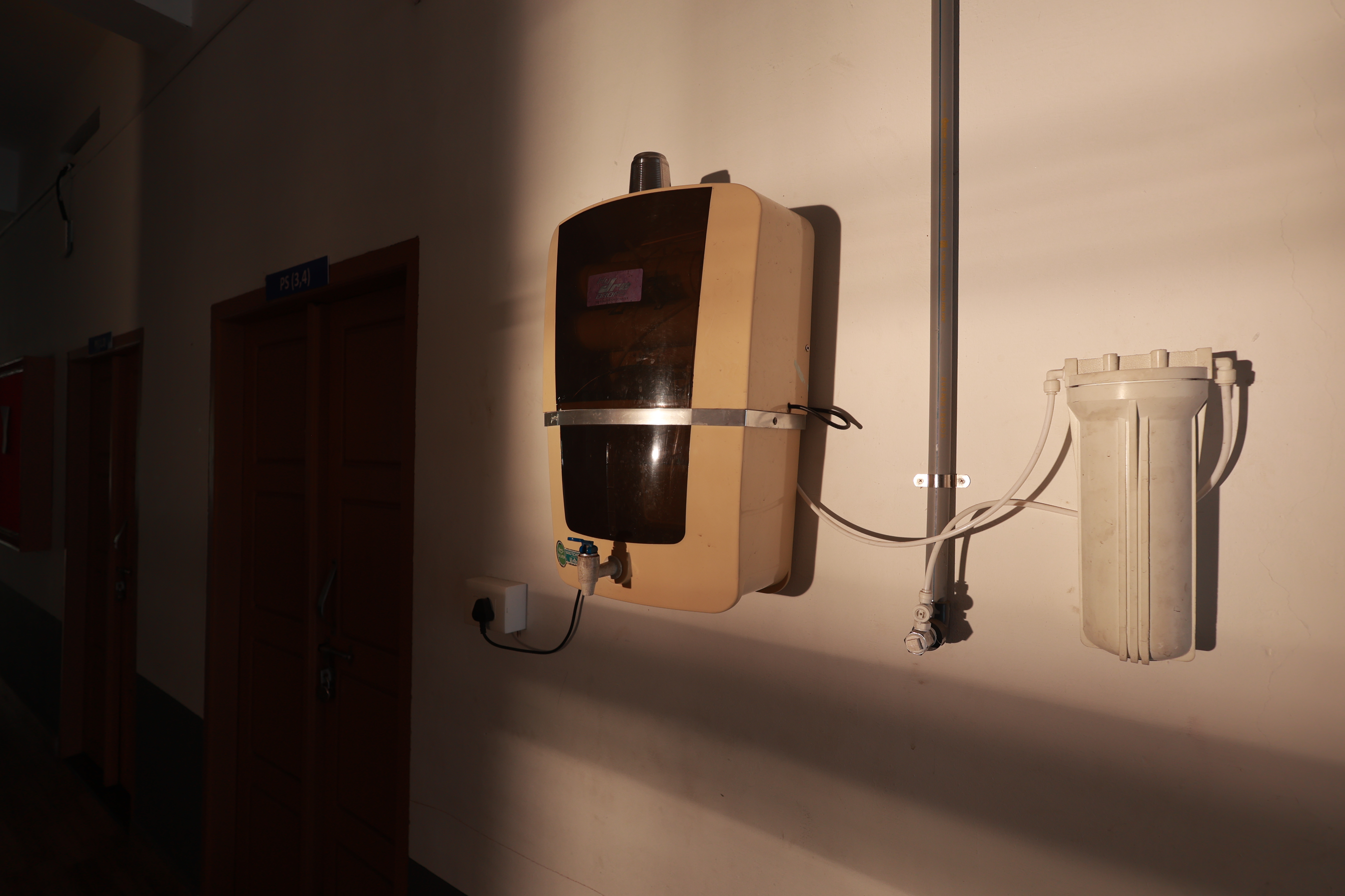 Carmelgiri College logo representing a minority Christian institution